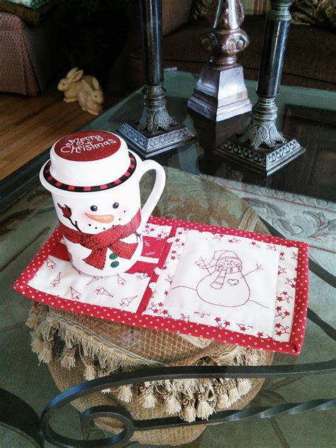 Snowman mug rugs with redwork embroidery | Redwork embroidery, Snowman mugs, Mug rugs