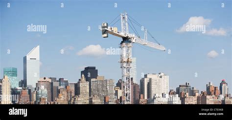 USA, New York, New York City, Manhattan, Skyline with crane Stock Photo - Alamy