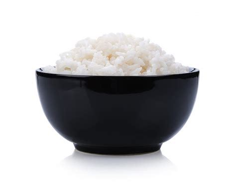 Premium Photo | Rice in black bowl