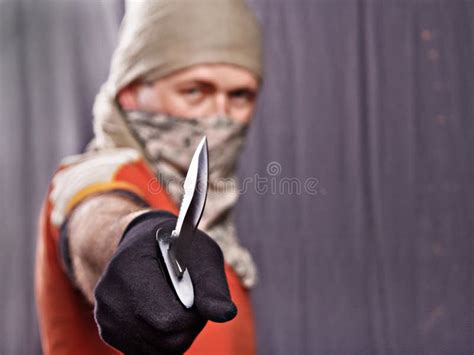 Man holding knife stock photo. Image of criminal, burglar - 50928598