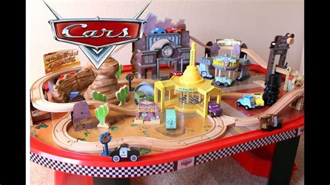 KidKraft Disney Cars Toy - Radiator Springs Race track Set and Table - YouTube