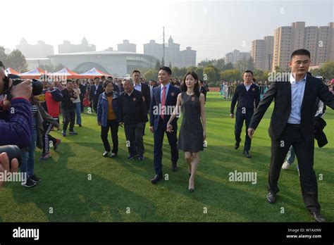 Richard Liu Qiangdong, left, Chairman and CEO of JD.com, and his wife Zhang Zetian, also known ...