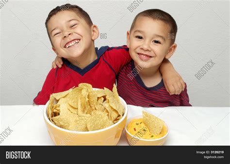 Children Eating Chips Image & Photo (Free Trial) | Bigstock