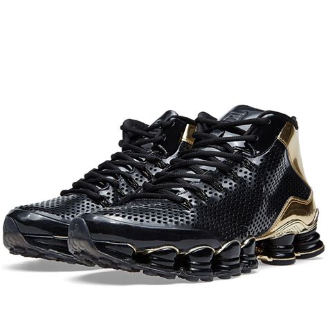 Nike Shox TLX Mid SP Black & Metallic Gold | END.