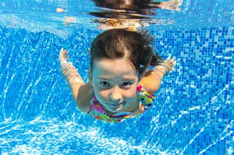 Happy Smiling Underwater Child In Swimming Pool Stock Image - Image ...