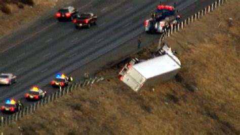 Big Rig Crashes Through Guardrail on Top of Freeway Embankment – NBC Los Angeles