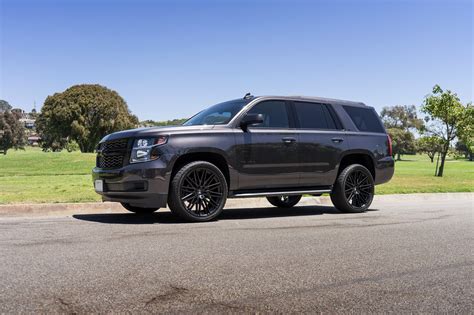 Black on Black Chevy Tahoe with Custom Projector Headlights | Black ...