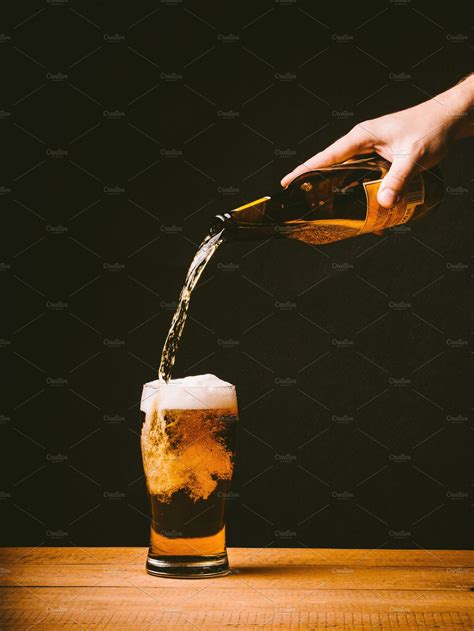 Pouring beer | High-Quality Food Images ~ Creative Market