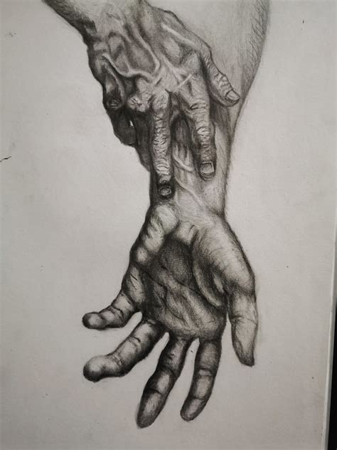 A sketch of old hands with a reference photo : sketches