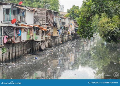 Bangkok, Thailand: Slums Along A Smelly Canal Khlong Toei Full Of Mud ...