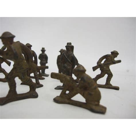 Eighteen Small Vintage Metal Soldiers