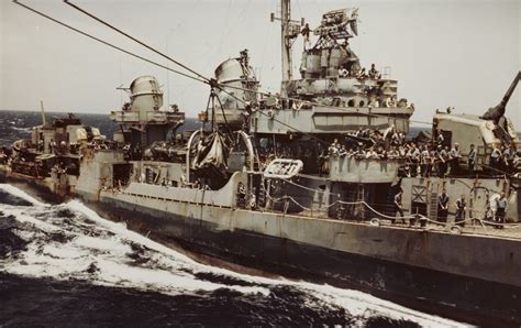 Fletcher-class destroyer engages in transfer at sea operations with USS Randolph (CV-15) in May ...