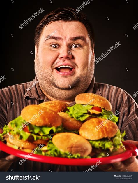 Fat Man Eats Burgers Obeseness Gluttony Stock Photo 1434565631 | Shutterstock
