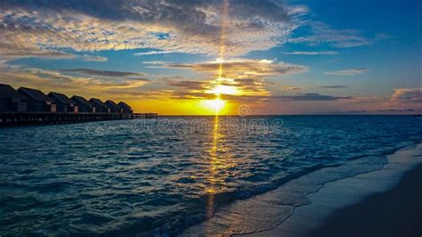 Sunset in Maldives Beach Island Stock Photo - Image of waves, ocean ...