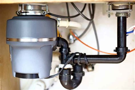 How to Replace a Garbage Disposal in a Sink - TheDIYPlan