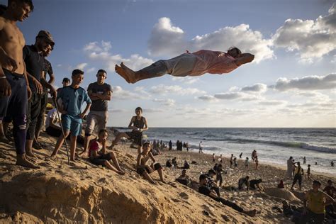 On beaches in Israel and Palestine, photos show common ground