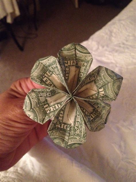 Origami Flower made from 3 $1 dollar bills & florist wire. Made this for my daughter who lost ...