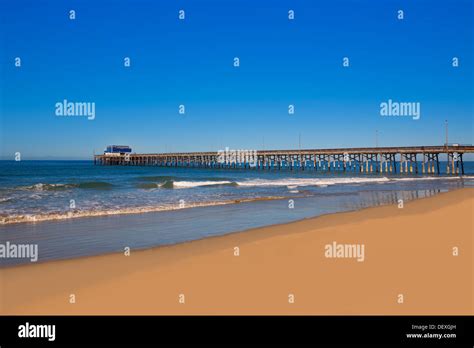 Newport pier beach in California USA surf spot Stock Photo - Alamy