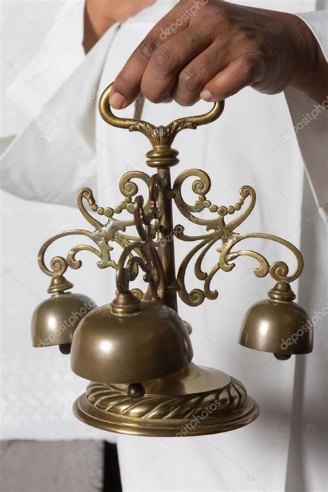 Consecration bells during holy mass Stock Photo by ©Klanneke 28890449