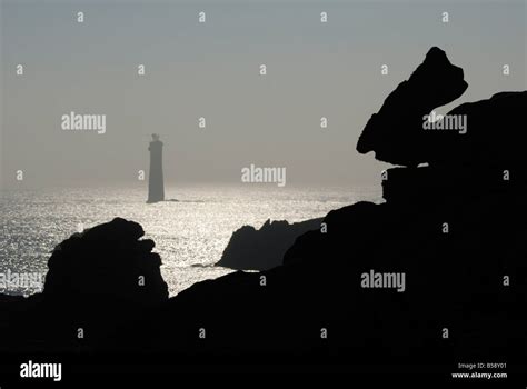 Dramatic seascape and lighthouse, Island of Ushant (Ile d'Ouessant), Brittany, France, Europe ...