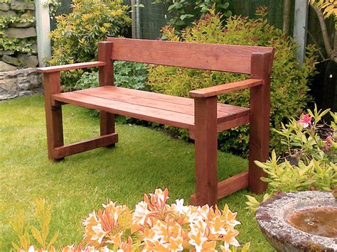 A very sturdy two-seater garden bench made from solid re-claimed wood ...