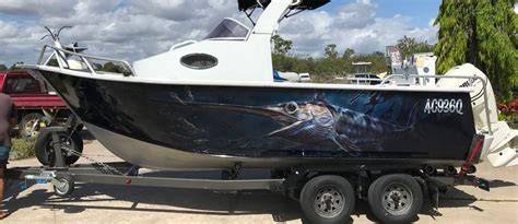 Fishing Boat Wraps and Signage - Custom Design and Installation Services
