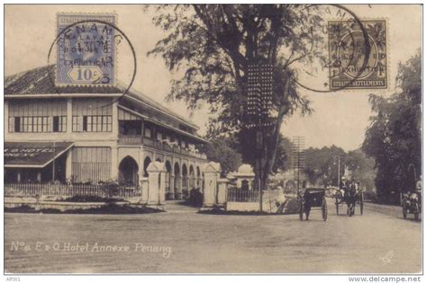 Vintage 1923 postcard of a street scene in front of the E & O Hotel Annexe in Penang Malaya ...