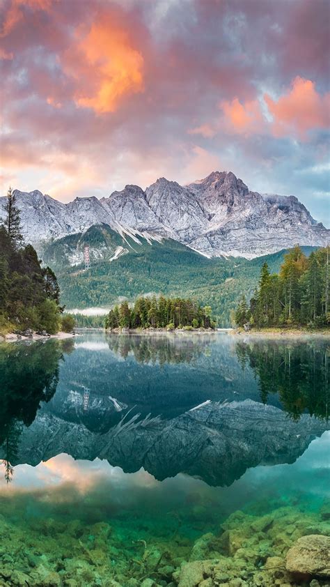 Mountain peak Zugspitze, summer day at lake Eibsee, Garmisch ...