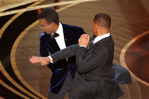 Will Smith smacks Chris Rock on stage, then apologizes upon winning Oscar