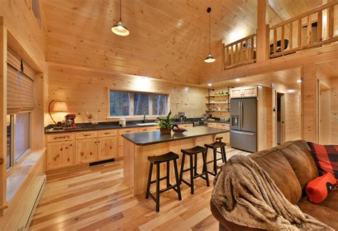 white pine log cabin kitchen with fridge enclosure | Cozy Cabins, LLC