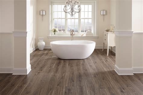 Smoky Dusk Water-Resistant Laminate | Hardwood floors in bathroom, Wood floor bathroom, Floor design