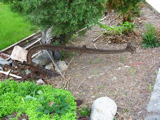 Montanadad: Rusty old tractor parts lawn art