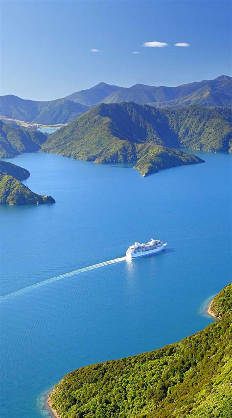 Cruise ship in Marlborough Sounds, New Zealand. Leaving Picton i ...