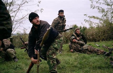 Chechen rebels during a Russian helicopter attack near Goragorsk ...