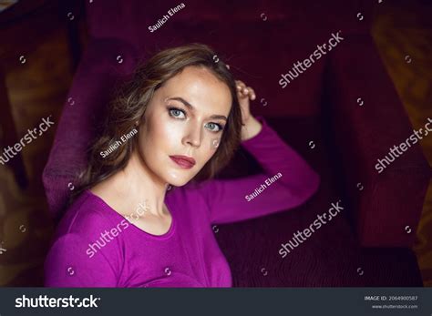Young Tall Woman Sitting On Chair Stock Photo 2064900587 | Shutterstock