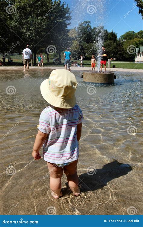 Toddler in wading pool stock image. Image of childhood - 1731723