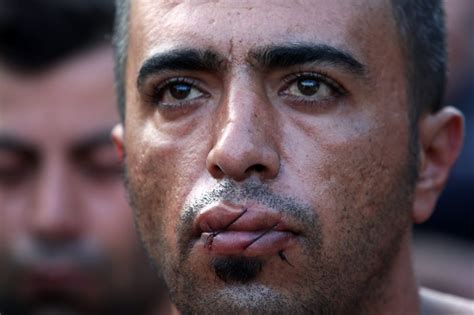 PICS: Economic Migrants Sew Lips Shut, Demand To Be ‘Shot’ In Protest ...