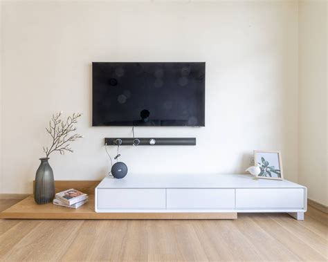 White Minimalistic TV Unit Design | Livspace