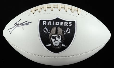 Sebastian Janikowski Signed Raiders Logo Football (JSA) | Pristine Auction