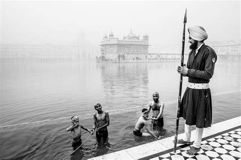 Happy ablutions at sacred Amrit Sarovar Photo by Serge Bouvet — National… Colonial India ...