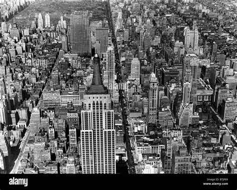 An aerial view of midtown Manhattan, looking north from the Empire Stete Building (foreground ...