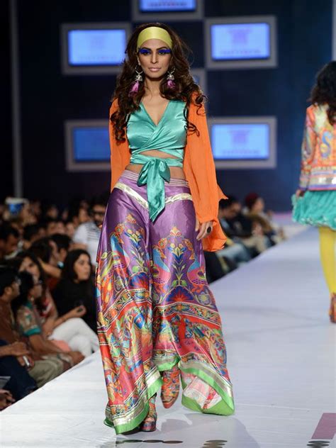 Rizwan Beyg - 7th PFDC Sunsilk Fashion Week: Blue top and wacky shoes. Sunsilk, Eastern Dresses ...