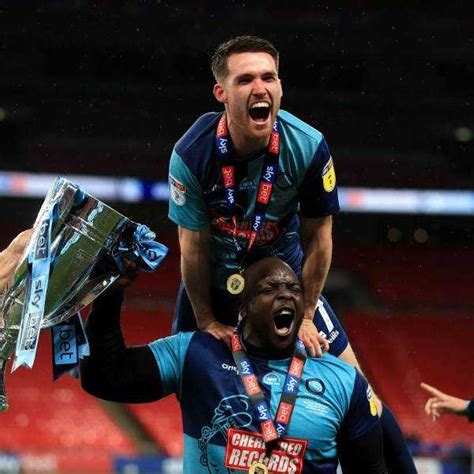 Wycombe Wanderers secure promotion to the Championship, Akinfenwa ...