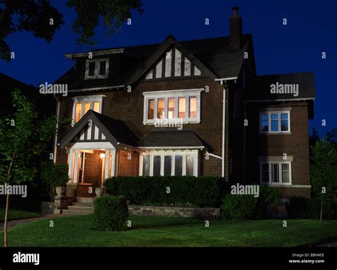 Beautiful family house nighttime scenery Stock Photo - Alamy