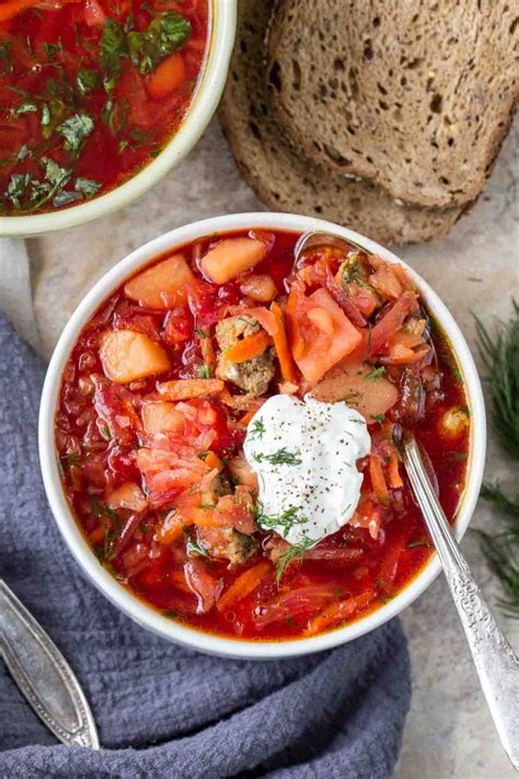 A classic Russian borscht recipe. Soup with beets, pork, potatoes ...