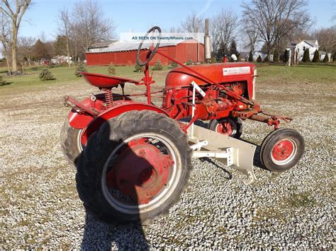 Mccormick Farmall Cub Tractor With Blade And Plow Attachments, Wheel Weights