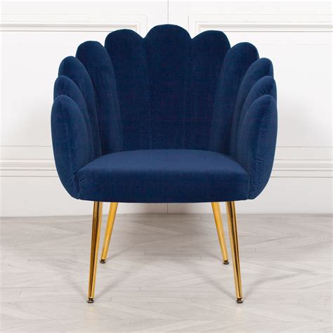 Blue Scalloped Arm Chair is presented by its charming curves