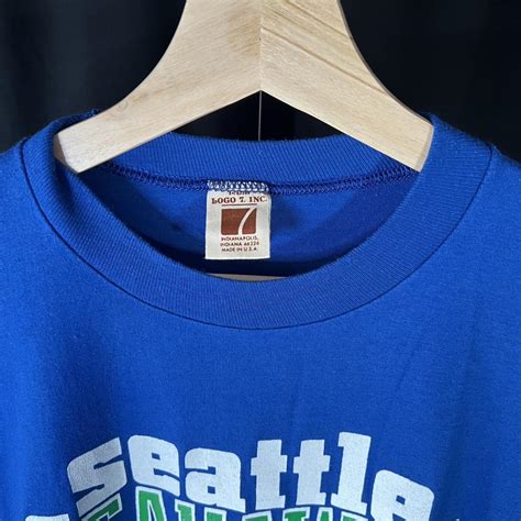 1980s Logo 7 NFL Seattle Seahawks Tee Size... - Depop