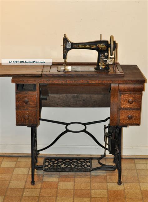 Antique Domestic Treadle Sewing Machine And Cabinet With Instructions ...