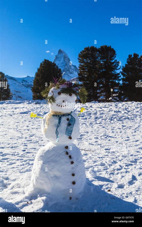 Cute snowman under Matterhorn in Zermatt, Switzerland Stock Photo - Alamy